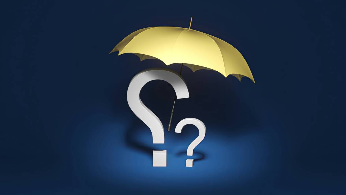 Bali traveler reviewing change protection insurance documents at airport lounge